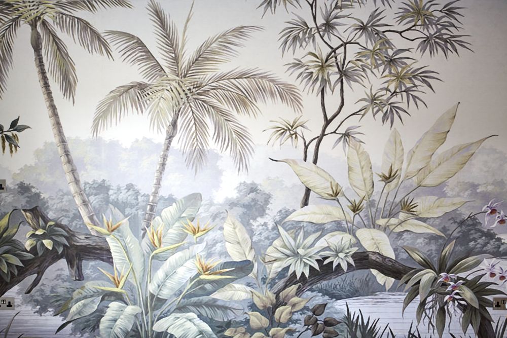 The feature wall in the living room, showing the floral wallpaper