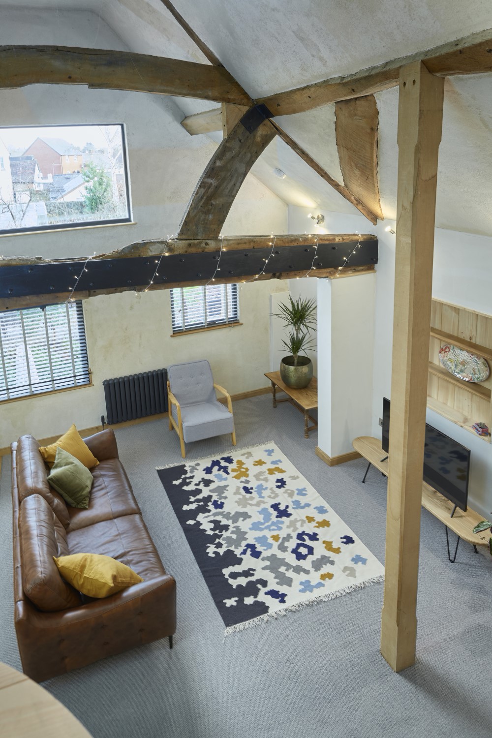 The view from the main bedroom down to the living area